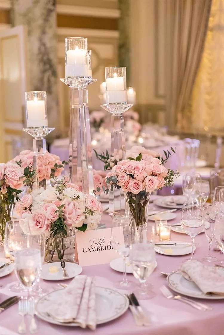 Blush rose centrepiece in a gold urn on a formal dinner table