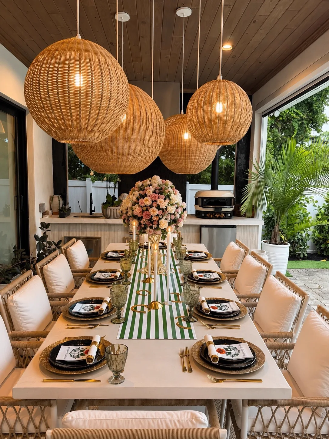 Guests styling a long table with candles and greenery